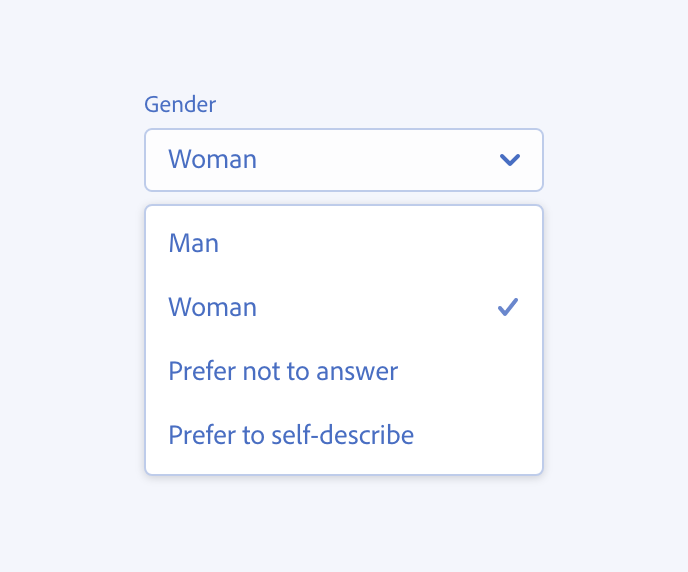 Example of a do guideline. UI mockup of a 'Gender' dropdown field, open to show four options: Man, Woman (currently selected, indicated by a checkmark), Prefer not to answer, and Prefer to self-describe.