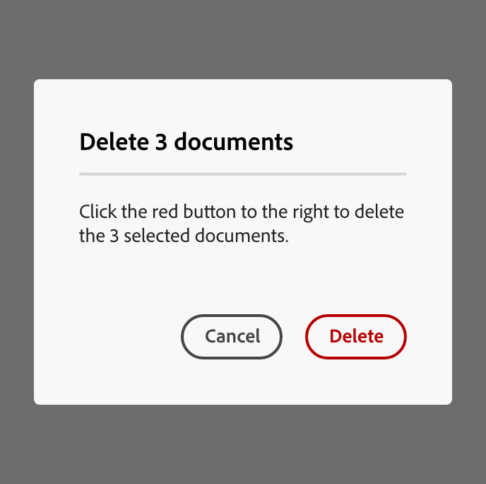 Example of a poorly written confirmation dialog titled "Delete 3 documents," with body text reading "Click the red button to the right to delete the 3 selected documents," relying on color ("red") and position ("to the right") to identify the button rather than its label.