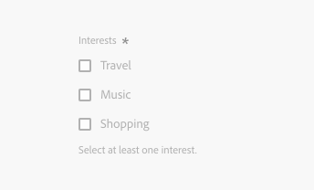 Key example of a checkbox group in a disabled state. Required field label, Interests. 3 checkboxes, labels Travel, Music, Shopping. Description text in grey, Select at least one interest. Radio group is faded in grey color to show that it can’t be interacted with.