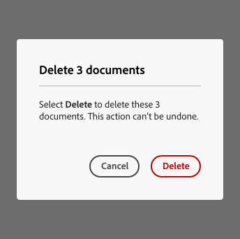 Key example of how to avoid referring to objects by color or location alone. An alert dialog describing a potentially destructive action. Title, Delete 3 documents. Description, Select Delete to delete these 3 documents. This action can’t be undone. 2 buttons, Cancel and Delete. Cancel is in the color grey and Delete is in the color red.