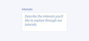 Key example of incorrect usage of placeholder text instead of help text in a text area. Text area label, Interests. Placeholder text inside of text area, Describe the interests you’d like to explore through our tutorials.