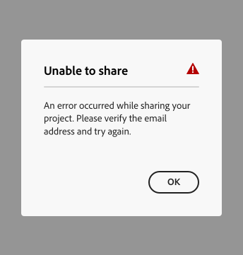 Key example of an error alert dialog, including an error icon, showing a suitable error message. Dialog title, Unable to share. Dialog description, An error occurred while sharing your project. Please verify the email address and try again. One button, label OK.